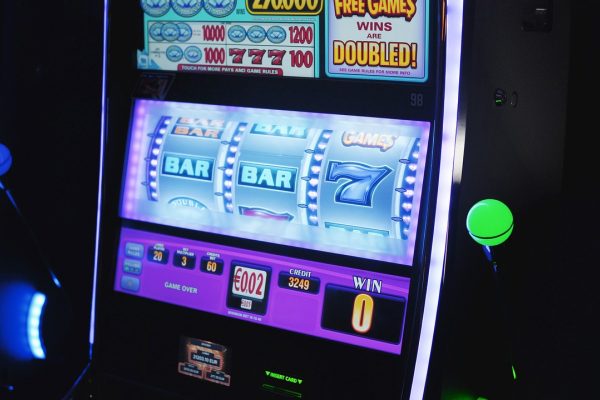Modern video slot machine interface showing spinning reels and casino games bonus symbols